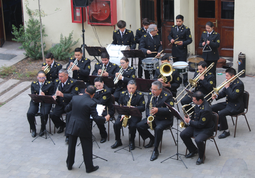 Afiche del evento "Banda Instrumental del Cuerpo de Bomberos de Santiago"